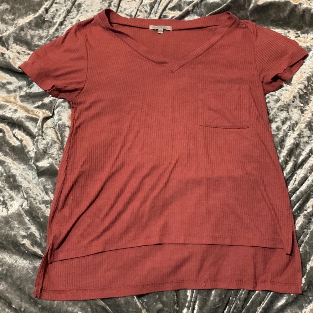 Small pink Charlotte Russe top with front pocket